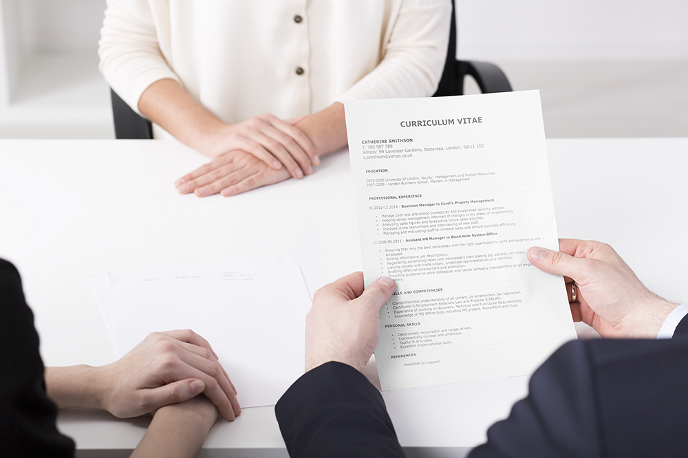 A CV being read at a job interview